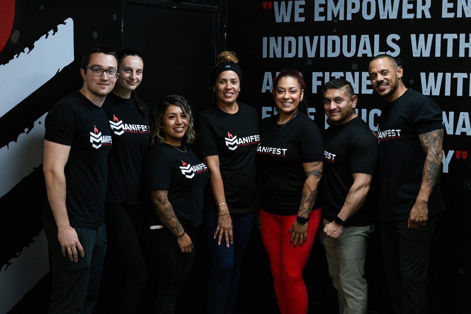 The Manifest Fitness Institute team inside the Dallas training facility